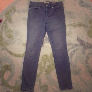 Distressed gray skinny jeans